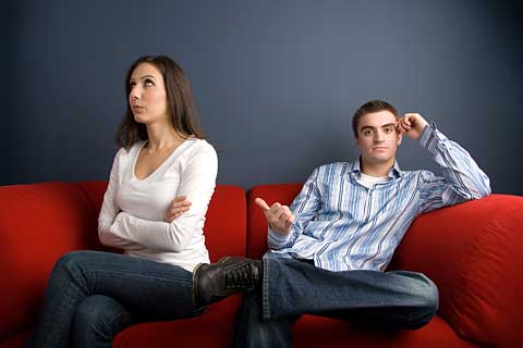 Quarreling couple, blaming each other